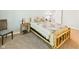 Inviting bedroom with a rustic wooden bed frame and a comfortable, restful atmosphere at 1356 S Catamaran Cir, Cicero, IN 46034