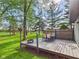 Outdoor deck includes a dining area with a table and chairs, perfect for enjoying meals and relaxing outside at 1356 S Catamaran Cir, Cicero, IN 46034