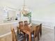 Comfortable dining room with warm lighting, creating the perfect Gathering space at 1356 S Catamaran Cir, Cicero, IN 46034