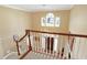 Elegant foyer with a chandelier, staircase, and a window providing natural light at 13827 Driftwood Dr, Carmel, IN 46033