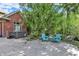 Cozy outdoor patio area with a hot tub and comfortable seating for relaxation at 13827 Driftwood Dr, Carmel, IN 46033