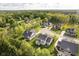 Overhead aerial shot displays suburban homes located on a quiet cul-de-sac surrounded by mature landscaping at 14003 Grannan Ln, Carmel, IN 46074