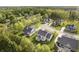 Scenic aerial shot of houses nestled among lush trees in a desirable neighborhood with cul-de-sac at 14003 Grannan Ln, Carmel, IN 46074