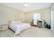 Comfortable bedroom with a queen bed and natural light at 14003 Grannan Ln, Carmel, IN 46074