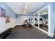 Home gym features exercise bike and mirrored wall at 14003 Grannan Ln, Carmel, IN 46074