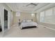 Spacious main bedroom features tray ceilings, and an ensuite bathroom at 14003 Grannan Ln, Carmel, IN 46074