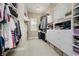 Well-organized walk-in closet with ample shelving and storage for clothes and accessories at 14003 Grannan Ln, Carmel, IN 46074
