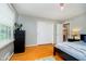 Bedroom with a calming palette and closet for storage needs at 1409 Alimingo Dr, Indianapolis, IN 46260
