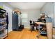 Organized office space featuring a desk, storage cabinets, and natural light, ideal for productivity at 1409 Alimingo Dr, Indianapolis, IN 46260