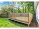 Outdoor wooden deck surrounded by lush greenery offering a serene space for relaxation and enjoying the outdoors at 1421 Laurel St, Indianapolis, IN 46203