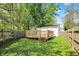 Backyard features a well-maintained wooden deck for outdoor enjoyment and entertaining at 1421 Laurel St, Indianapolis, IN 46203