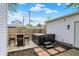 Cozy backyard with a luxurious hot tub and outdoor table and seating area perfect for relaxation and socializing at 1421 Laurel St, Indianapolis, IN 46203