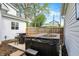 Cozy backyard with a hot tub and outdoor table area, ideal for relaxation and enjoying outdoor living at 1421 Laurel St, Indianapolis, IN 46203