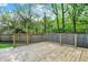 Spacious wooden deck with natural wood railing, perfect for outdoor entertaining and enjoying scenic views of the property at 1421 Laurel St, Indianapolis, IN 46203