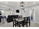 Open concept dining room with a dining table adjacent to the living area at 1421 Laurel St, Indianapolis, IN 46203