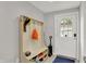 Convenient mudroom entry includes custom built-in bench and storage for coats, shoes, and accessories at 1421 Laurel St, Indianapolis, IN 46203