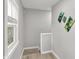 Second story hallway with natural light and decorative artwork at 1421 Laurel St, Indianapolis, IN 46203