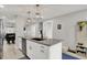 Open kitchen with granite countertops and stainless steel appliances is great for entertaining guests at 1421 Laurel St, Indianapolis, IN 46203
