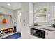 Bright kitchen with granite countertops, subway tile backsplash, and white cabinets is move-in ready at 1421 Laurel St, Indianapolis, IN 46203
