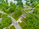 Aerial view of a home with a lakeside community at 15203 Shoreway Ct, Carmel, IN 46032