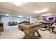 Recreational basement featuring a foosball table and seating at 15203 Shoreway Ct, Carmel, IN 46032
