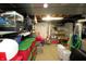 Basement storage room containing plastic containers and shelves with storage items at 15203 Shoreway Ct, Carmel, IN 46032