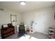 Bedroom featuring desk, white walls, built in bookcase and lots of natural light at 15203 Shoreway Ct, Carmel, IN 46032
