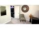 Bedroom with a view of the closet, decorative mirror, a chair, and a bedside table with flowers at 15203 Shoreway Ct, Carmel, IN 46032