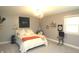 Charming bedroom with whimsical decor, including a neon 'Hogwarts' sign and a hanging chair at 15203 Shoreway Ct, Carmel, IN 46032