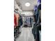 This is a well-organized walk-in closet, complete with shelving and hanging space for storage at 15203 Shoreway Ct, Carmel, IN 46032