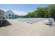 Outdoor pool with lounge chairs offers a refreshing space for relaxation and community gatherings at 15203 Shoreway Ct, Carmel, IN 46032