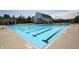 Spacious outdoor pool with lane markers provides a refreshing space for exercise and relaxation at 15203 Shoreway Ct, Carmel, IN 46032