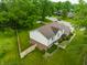 Aerial shot of a two story home with a fenced backyard and manicured lawn at 15203 Shoreway Ct, Carmel, IN 46032