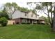 Beautifully maintained two-story home showcasing a well-manicured lawn and tasteful landscaping at 15203 Shoreway Ct, Carmel, IN 46032
