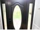 A stylish black front door with decorative glass panels and modern hardware at 15203 Shoreway Ct, Carmel, IN 46032