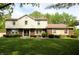 Charming two-story home featuring a well-manicured lawn, brick accents, and a welcoming front entrance at 15203 Shoreway Ct, Carmel, IN 46032