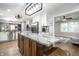 Spacious eat-in kitchen with a large island, stainless steel appliances, and natural light at 15203 Shoreway Ct, Carmel, IN 46032