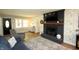 Cozy living room boasts fireplace, hardwood floors, and comfortable seating area at 15203 Shoreway Ct, Carmel, IN 46032