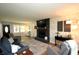 Inviting living room features a cozy fireplace, hardwood floors and ample seating at 15203 Shoreway Ct, Carmel, IN 46032