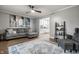 Spacious living room with neutral color scheme, hardwood floors, and an open floorplan at 15203 Shoreway Ct, Carmel, IN 46032