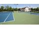 A look at the neighborhood tennis courts and clubhouse at 15203 Shoreway Ct, Carmel, IN 46032