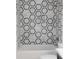 Modern bathroom featuring unique hexagon tile and tub at 1525 Marlowe Ave, Indianapolis, IN 46201