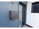 Stylish home entrance featuring a modern mailbox and a sleek front door with a window at 1525 Marlowe Ave, Indianapolis, IN 46201