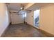 This garage features a garage door, garage door opener, and access to the stairs at 1525 Marlowe Ave, Indianapolis, IN 46201