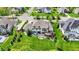 Expansive aerial view of the property showcasing the home, backyard, deck, hot tub, and the surrounding neighborhood at 16731 George Gang Blvd, Westfield, IN 46062