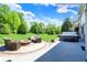 Inviting backyard with a patio, hot tub, fire pit, and seating, perfect for outdoor relaxation and entertainment at 16731 George Gang Blvd, Westfield, IN 46062