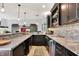 Modern bar area features sleek countertops, custom cabinets, a beverage cooler, and stylish backsplash at 16731 George Gang Blvd, Westfield, IN 46062