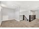 Spacious carpeted basement area with stairwell, and a cozy and versatile space for various activities at 16731 George Gang Blvd, Westfield, IN 46062