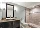Bathroom featuring a modern vanity, vessel sink, walk-in shower with a glass door, and contemporary fixtures at 16731 George Gang Blvd, Westfield, IN 46062