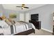Bright and spacious bedroom boasts neutral walls and a comfortable queen-sized bed, creating a serene retreat at 16731 George Gang Blvd, Westfield, IN 46062